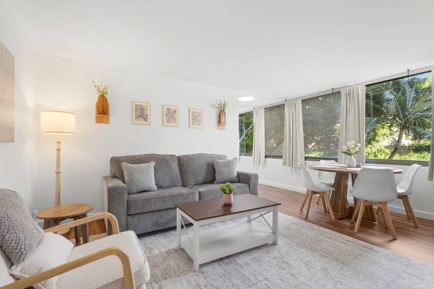 A sunny space made for slow mornings, with soft textures, fresh flowers, and a view that feels like vacation.