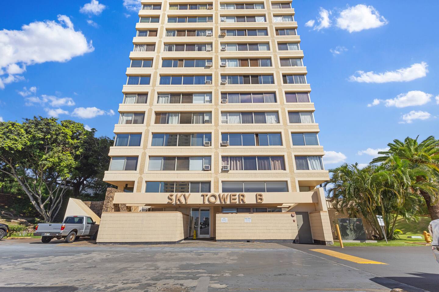 Welcome to Sky Tower B, a modern high-rise with sleek architecture, lush greenery, and easy access to urban living