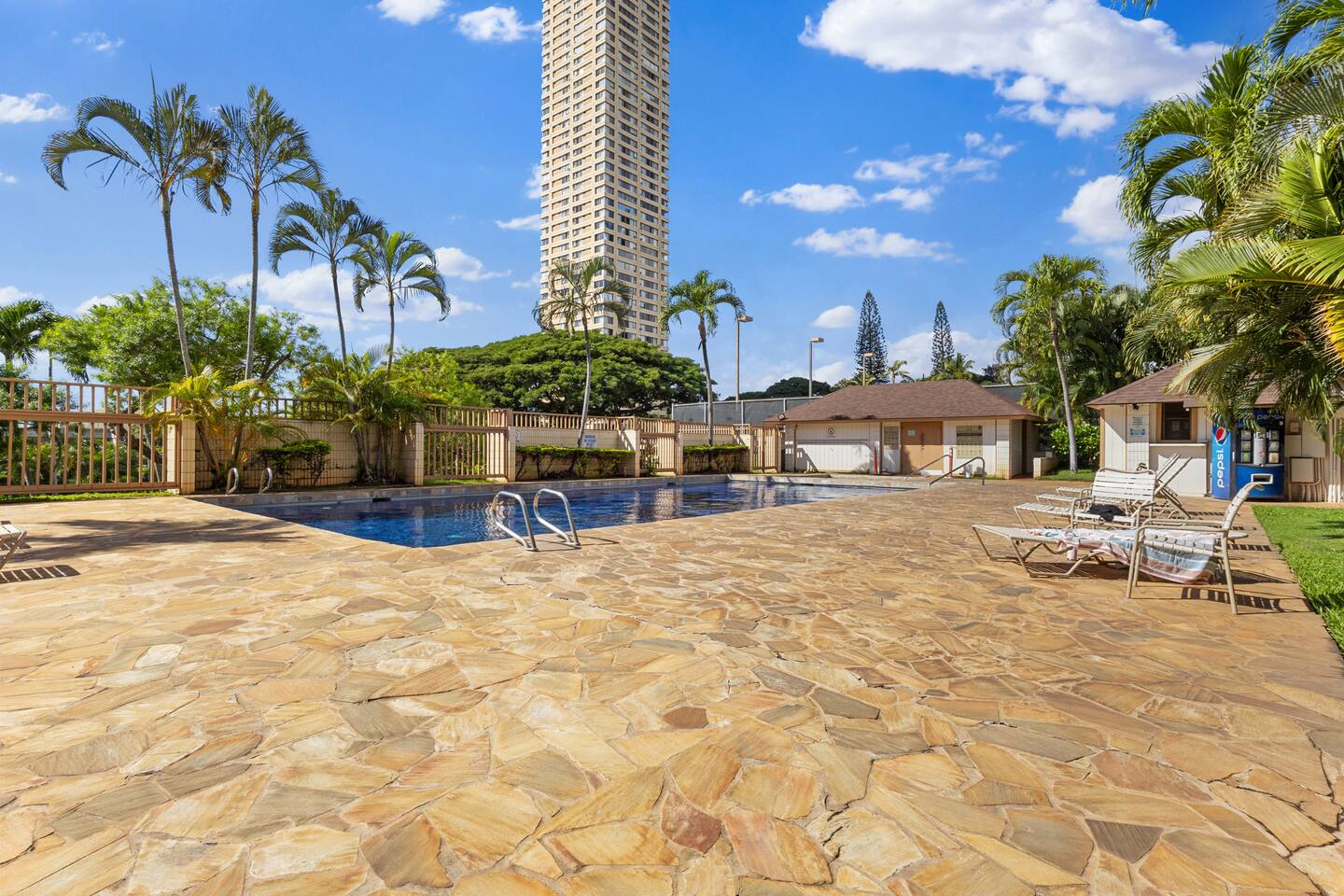 Relax, recharge, repeat, in this tropical poolside escape with just the right amount of shade and sparkle.