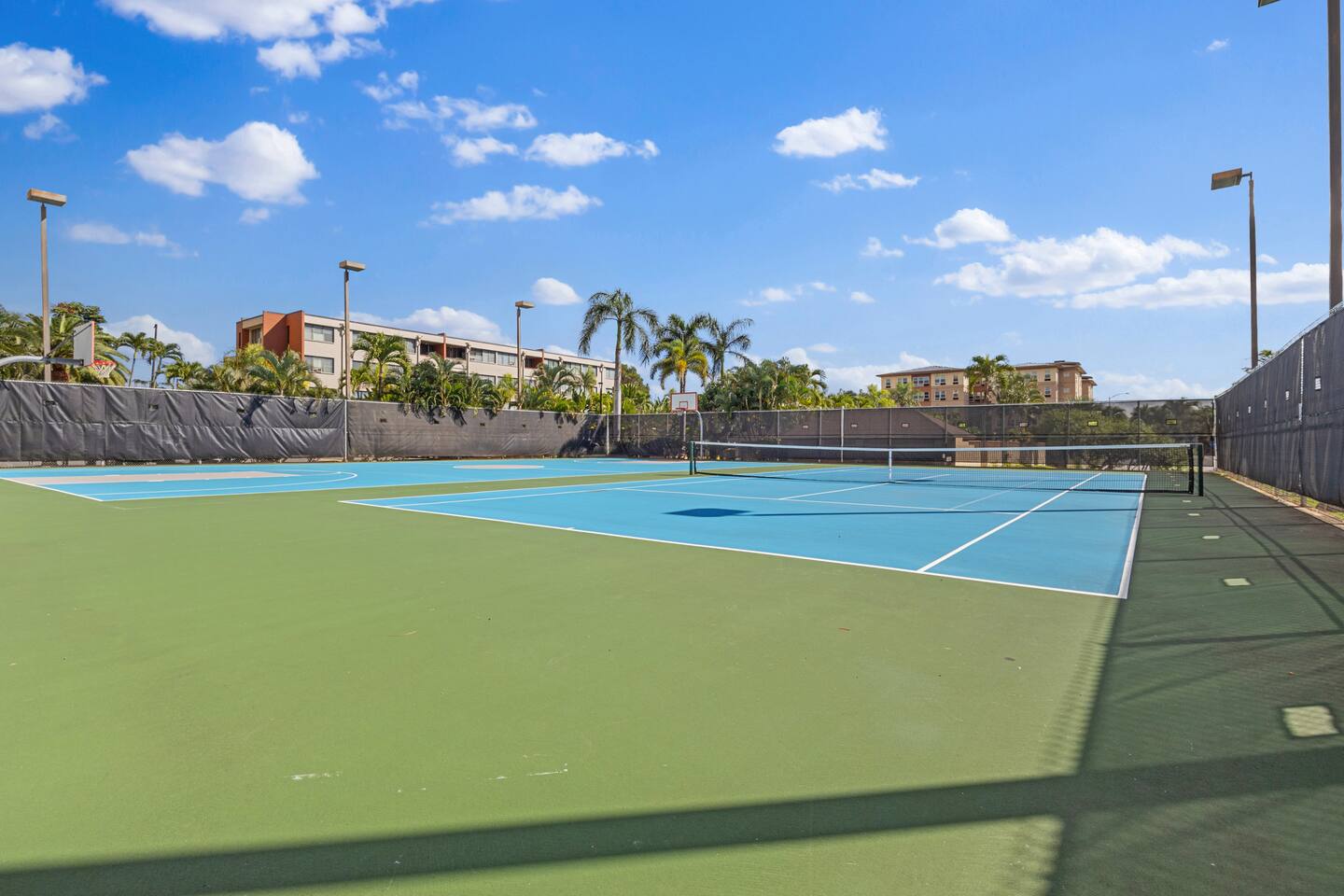 Your sunny spot for play and pause, with fresh courts, cool breezes, and tropical views all around.