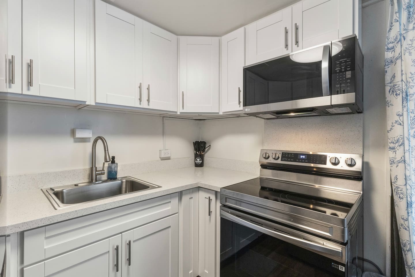 Bright mornings, easy meals. Whip up breakfast in this clean, modern corner with stainless steel style.