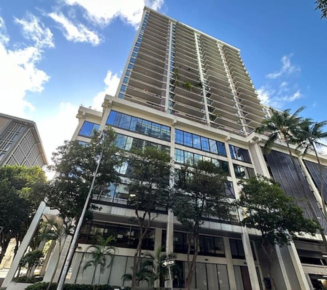 Modern design meets outdoor charm, blending architecture and shade for a refreshing street view.