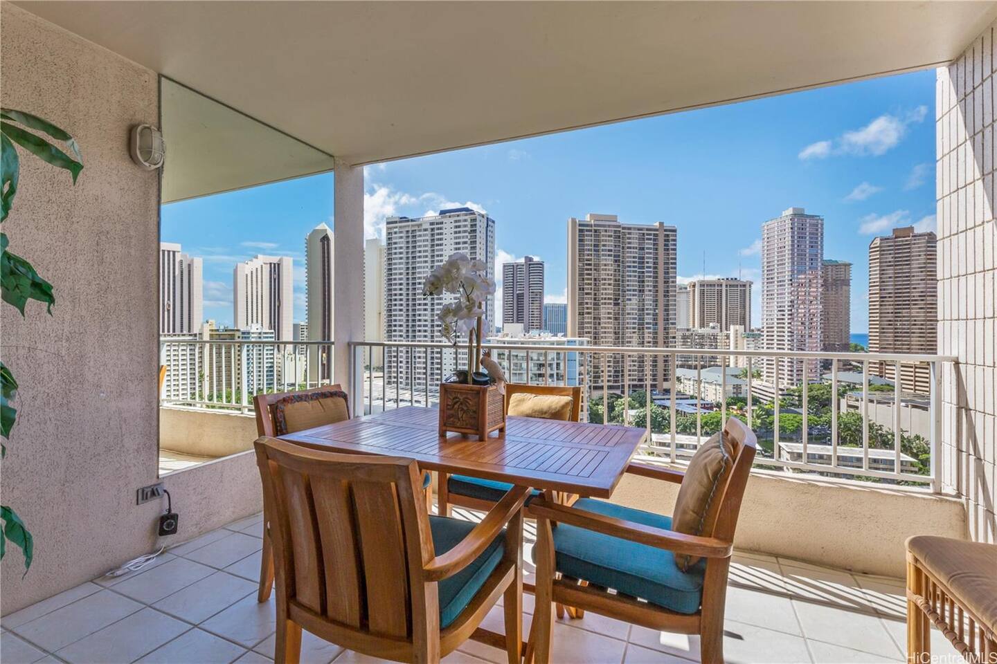 A breezy escape with skyline sparkle and sea views, perfect for morning coffee or sunset dinners.