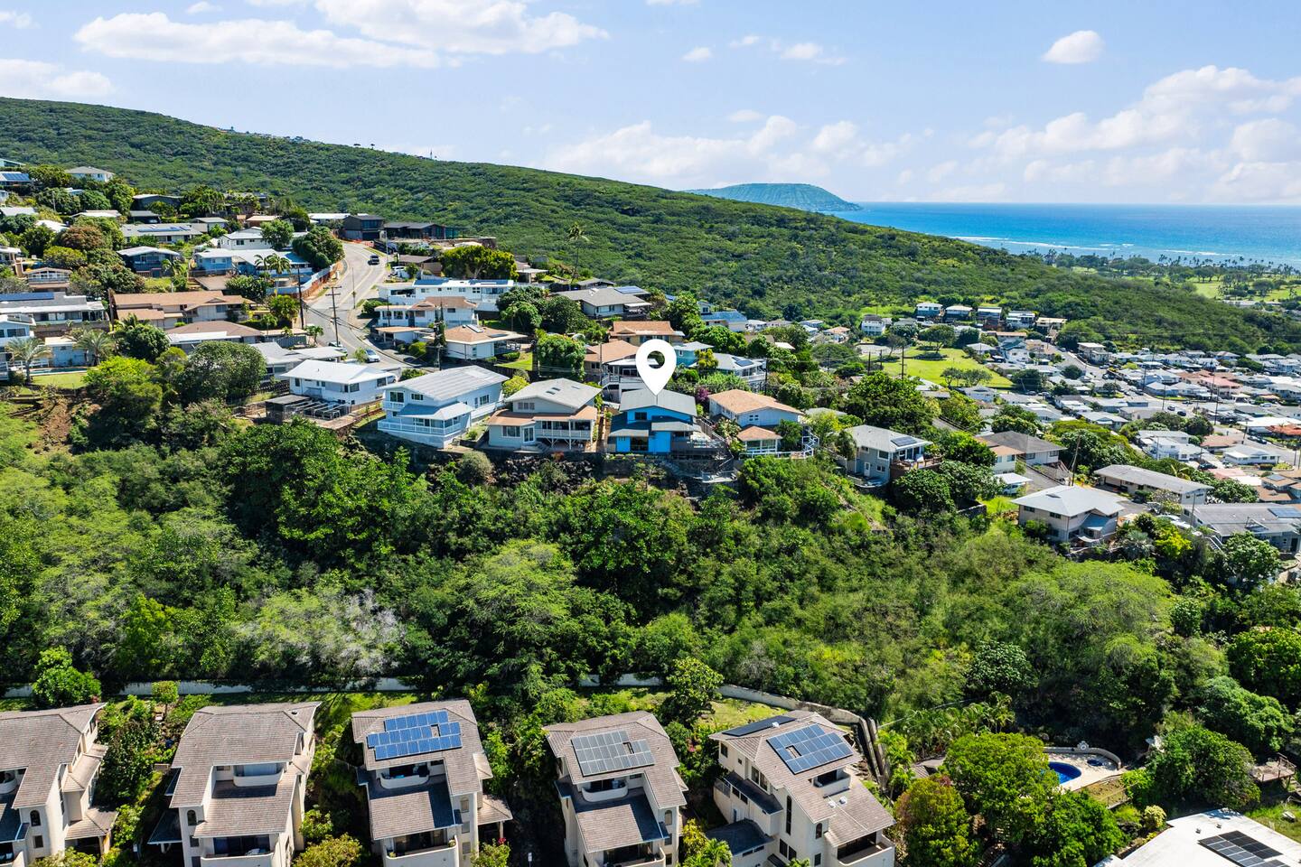 Perched above it all. Get a bird’s-eye view of your private island escape. Nestled on a quiet cliffside, this home offers total seclusion with the best of Honolulu just minutes away.
