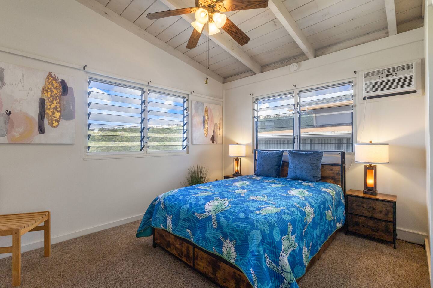 Bedroom two has views of the ocean and city as well, and includes AC.