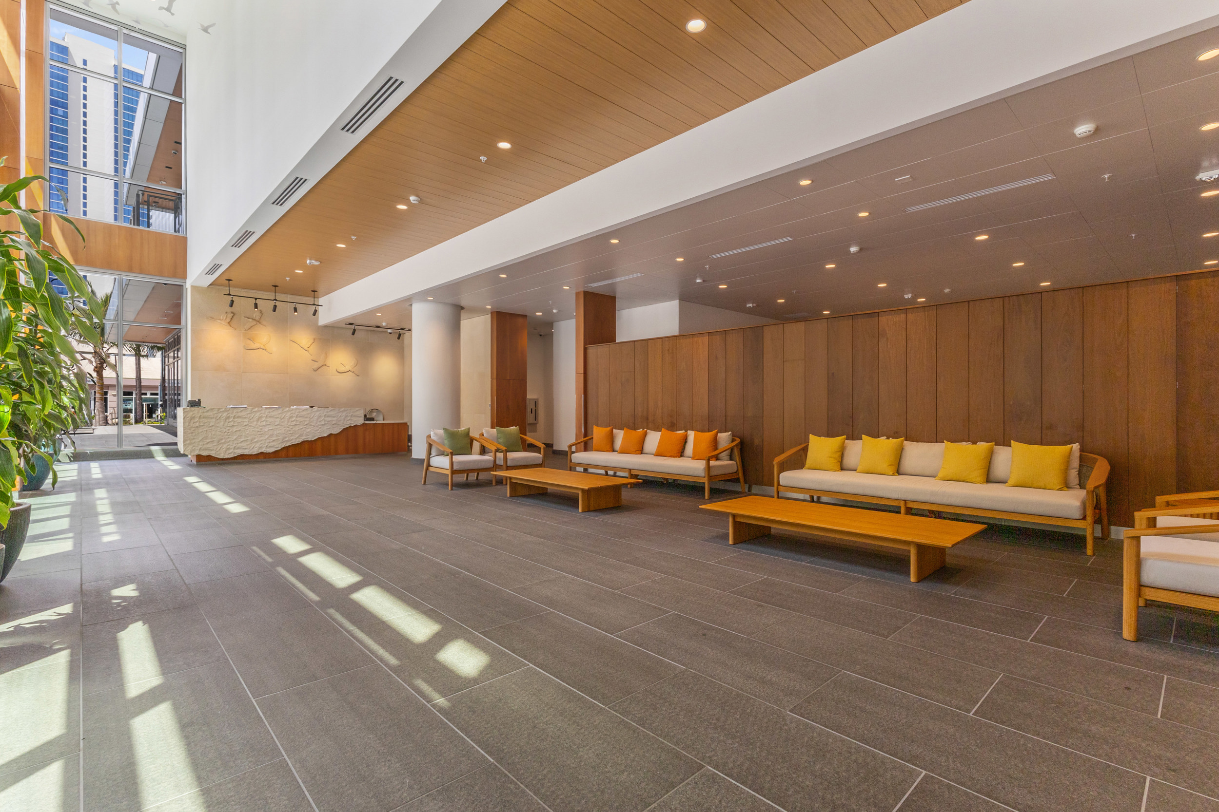 Bright, stylish lobby with soaring ceilings and welcoming lounge seating
