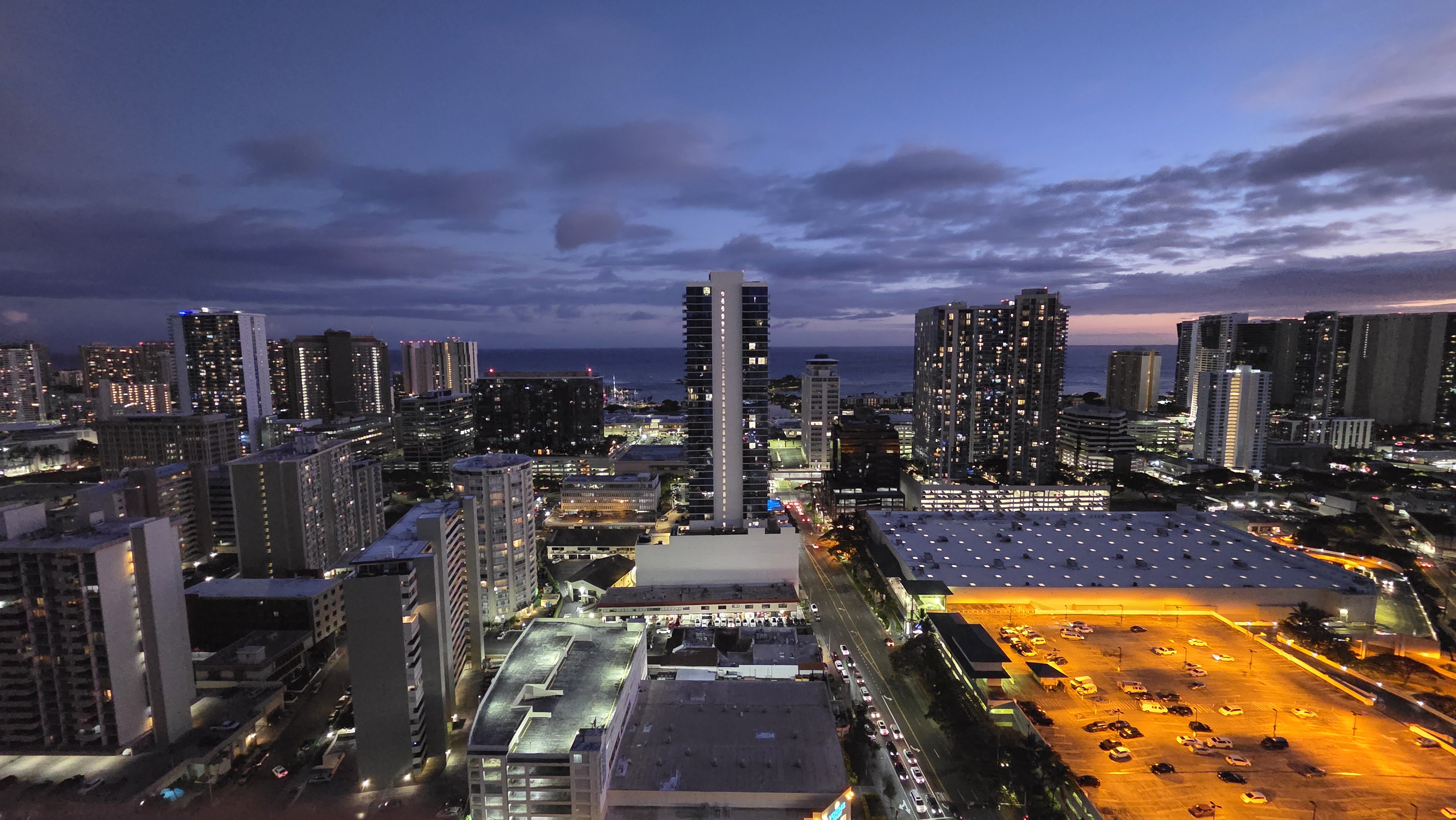 Stunning high-floor skyline and ocean views at sunset