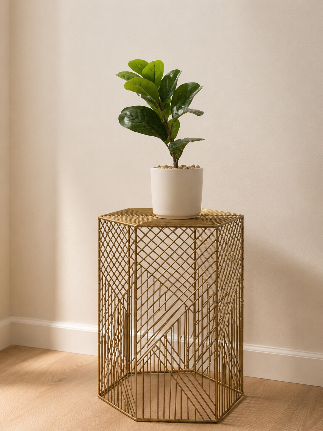 Elegant plant styling with a chic gold accent table