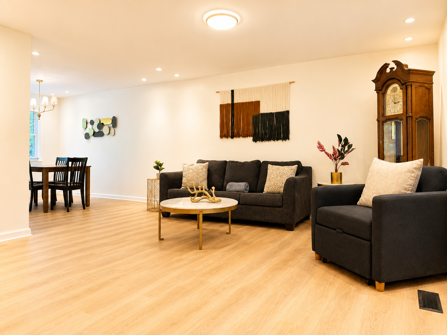 Bright open living area with cozy seating and dining space