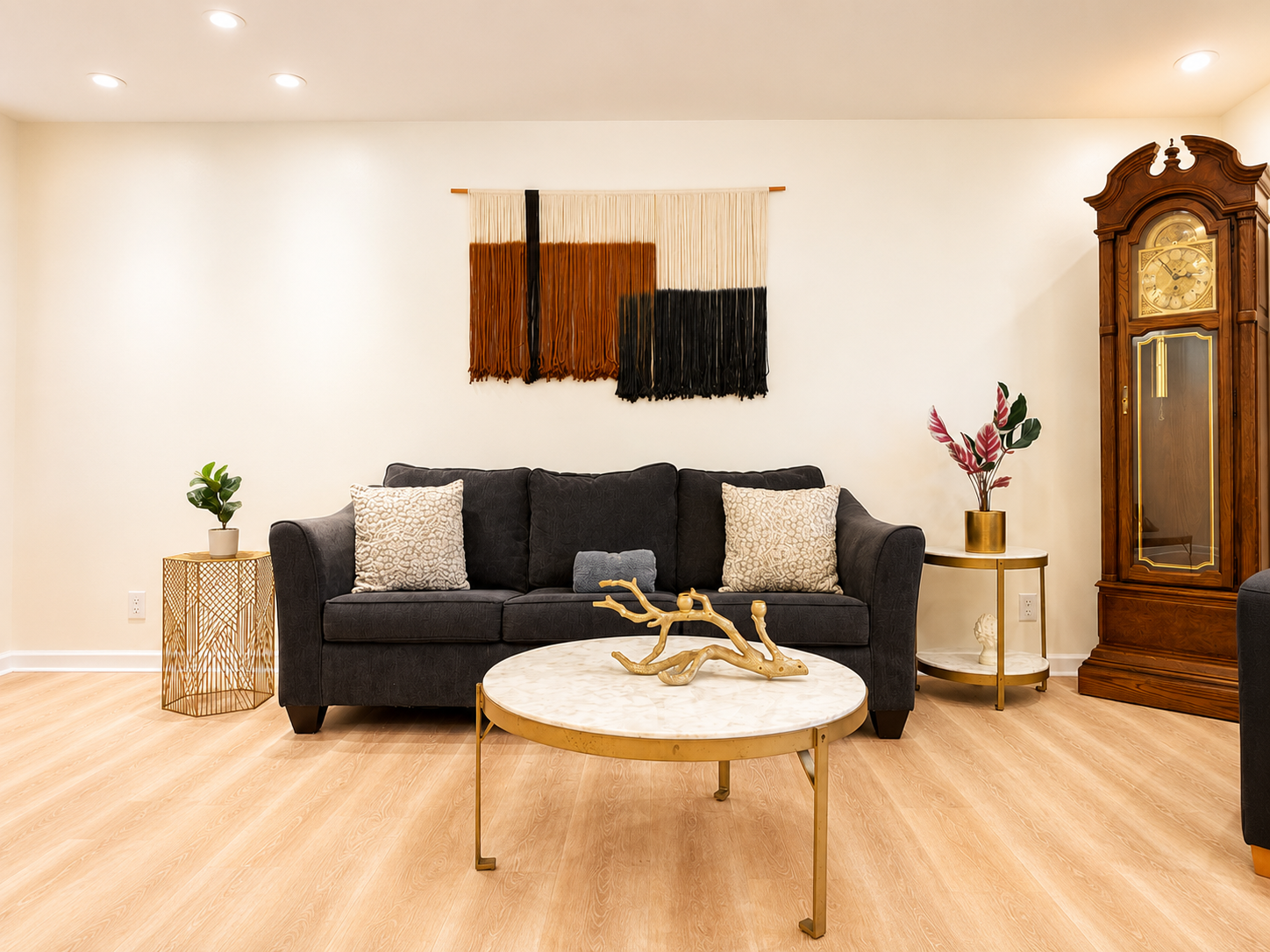 Stylish lounge with cozy sofa, chic decor, and warm modern touches