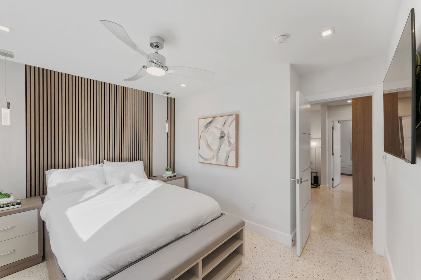 A warm and inviting bedroom featuring a queen-size bed for maximum comfort.