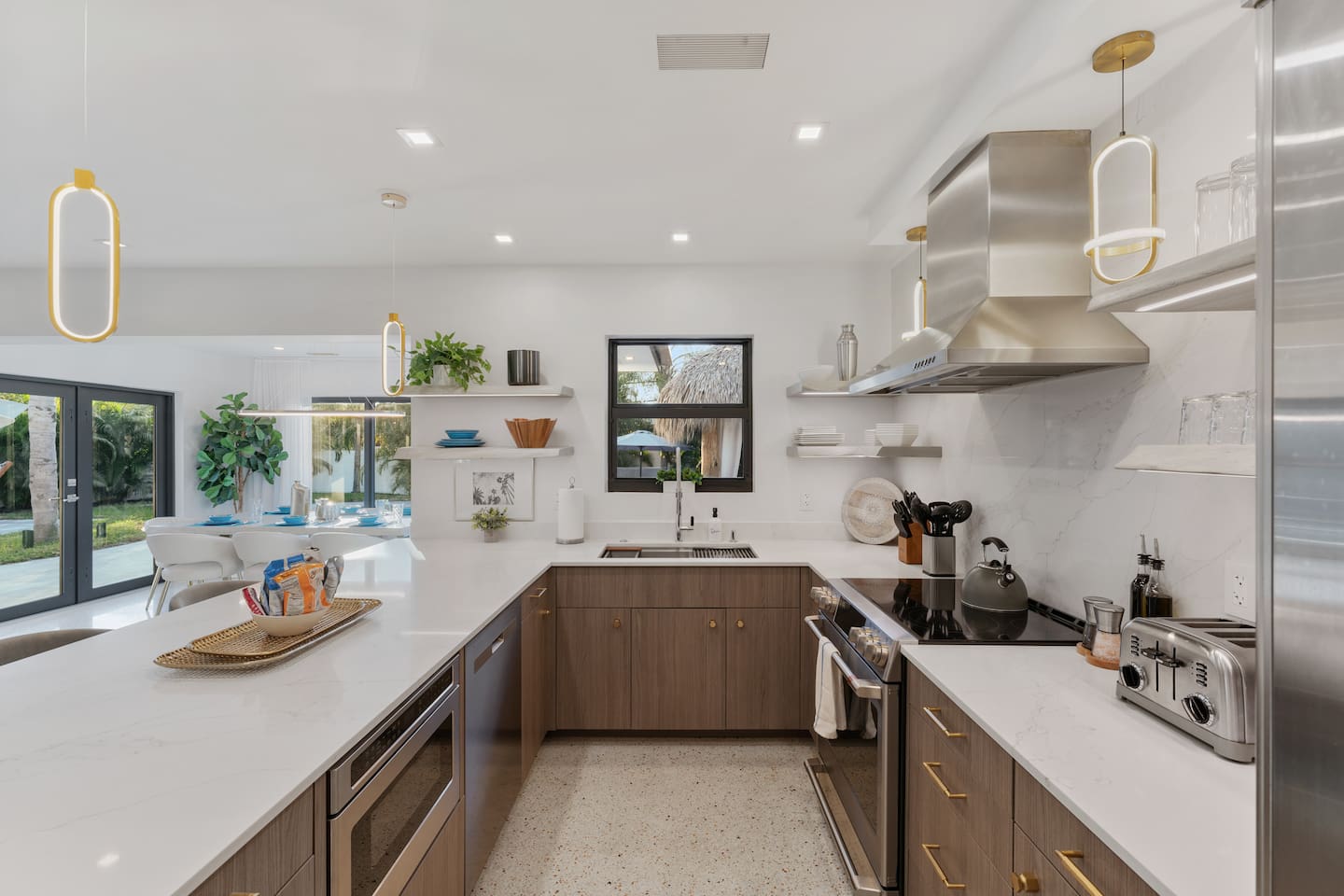 Enjoy the convenience of a fully stocked kitchen where you'll find cookware, bakeware, dishes, utensils, and modern appliances ready for your stay.