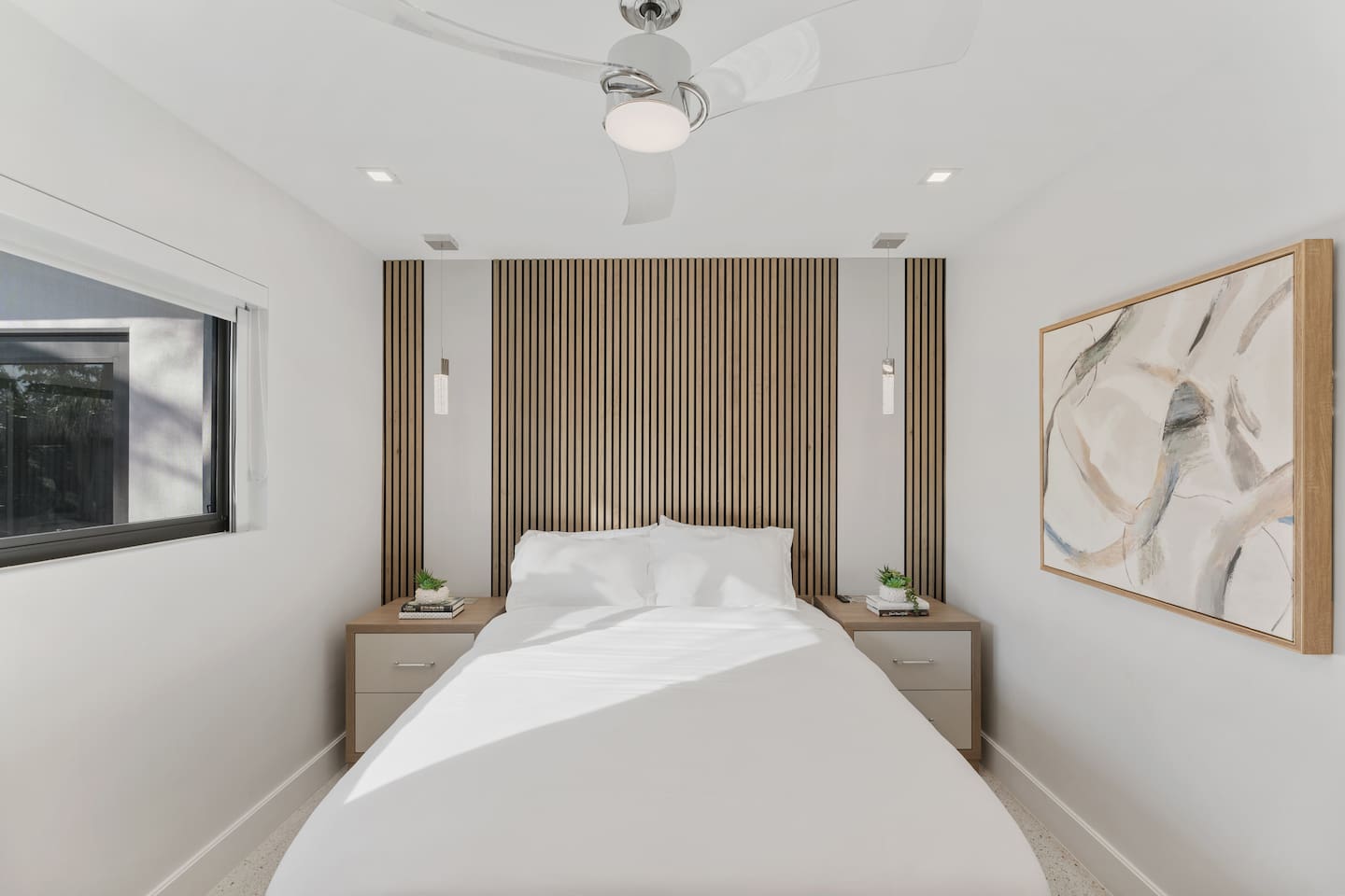 A peaceful bedroom with a queen-size bed, perfect for comfort and relaxation.
