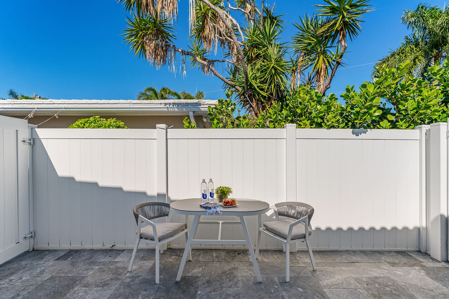 Step outside to your private patio, a peaceful spot to enjoy your morning coffee or unwind in the fresh South Florida air.