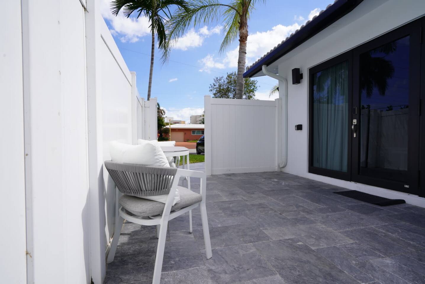 Private patio with outdoor dining table