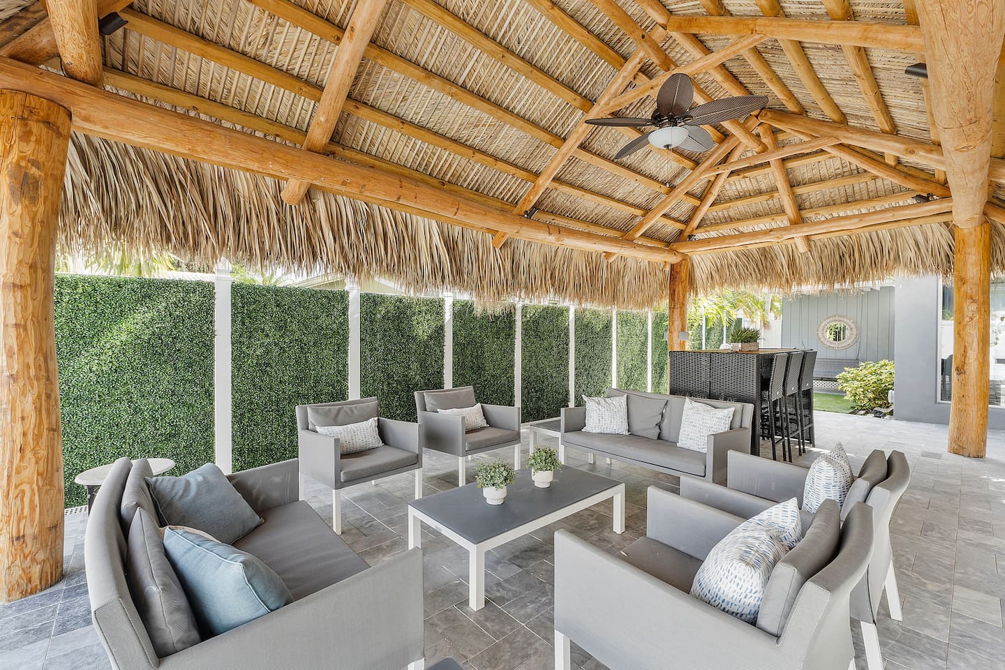 Designed for outdoor living, the patio features plenty of seating, perfect for effortless dining and entertaining.
