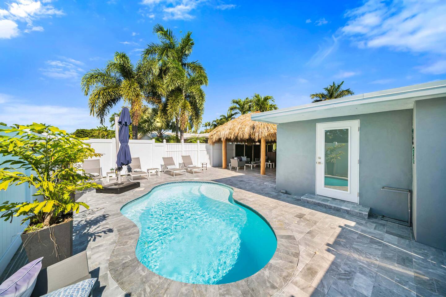 Your own private back yard with a pool & shaded tiki hut!