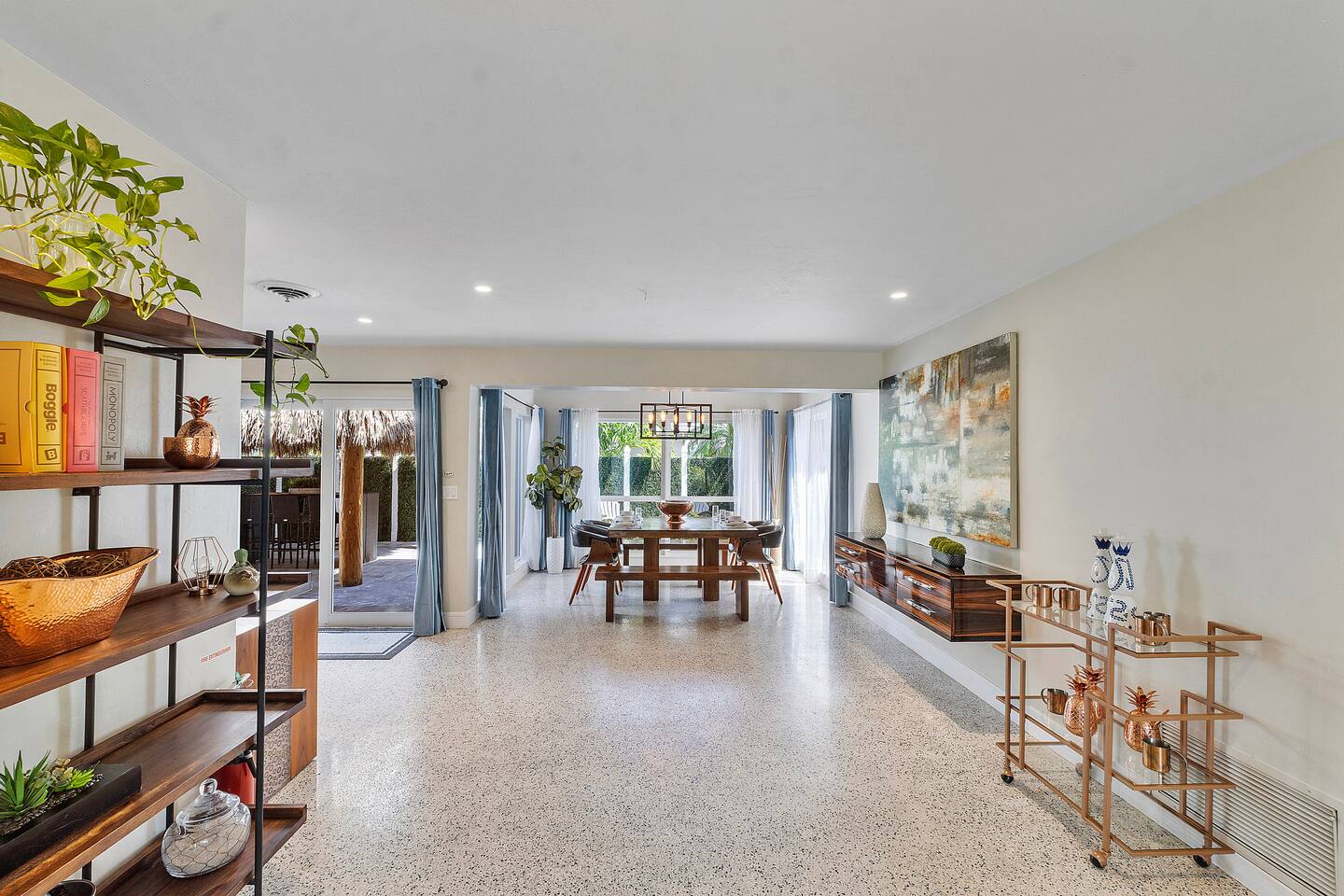 Minimalist décor paired with warm wood elements creates a bright and sophisticated living space.