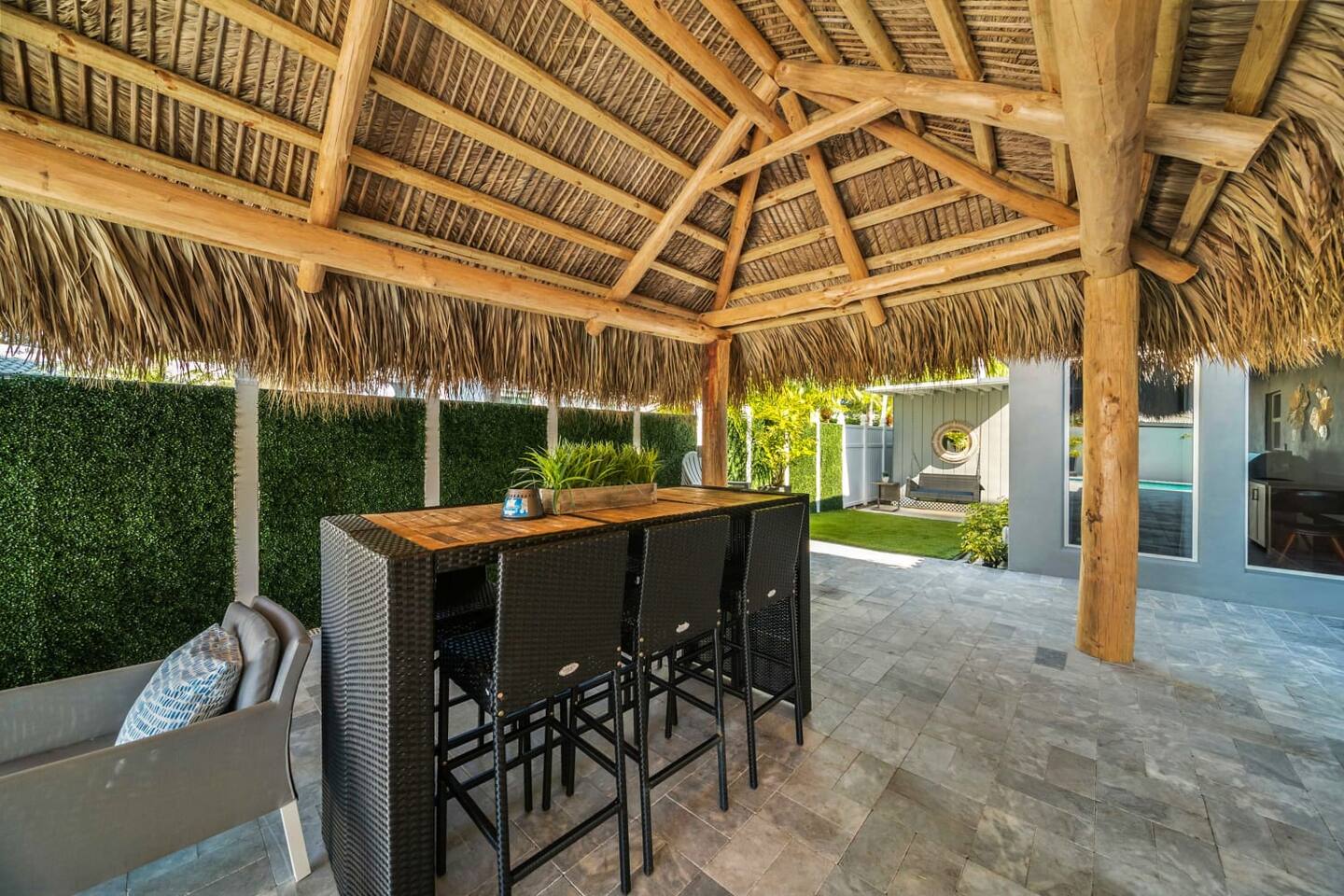 The palapa-shaded tiki hut with bar seating to enjoy a meal or beverage!