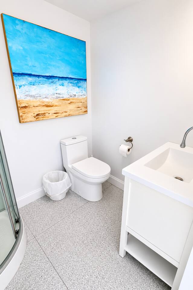 Stylish bathroom with thoughtful touches for a comfortable stay.