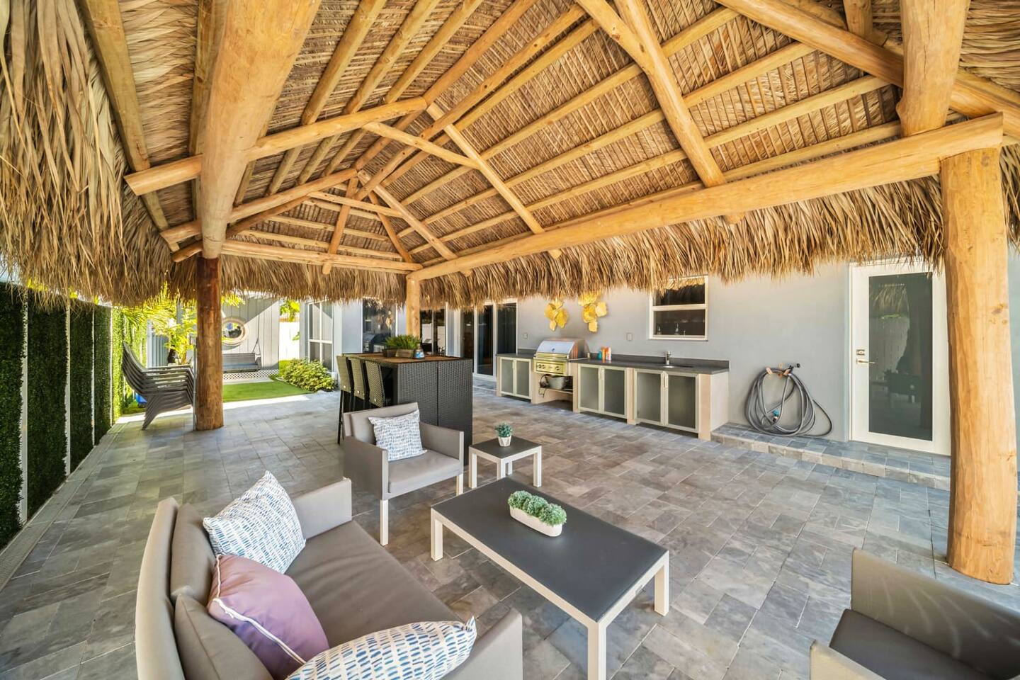 A wet bar & BBQ grill for outdoor dining & lounging