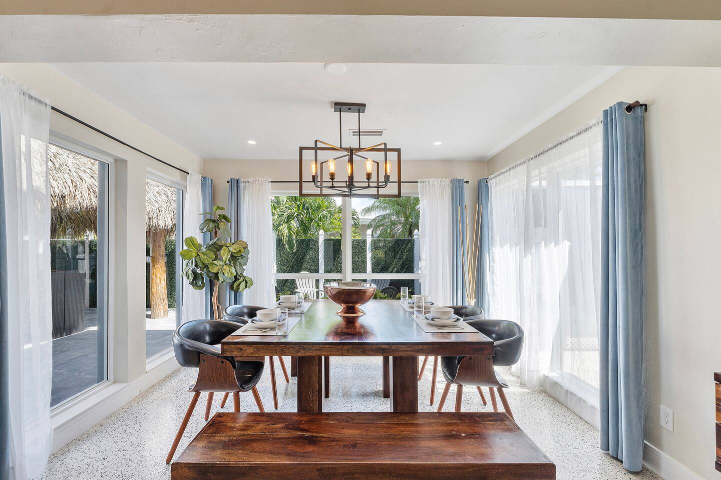 Enjoy effortless dining with a table perfectly positioned between the kitchen and living room, creating a seamless space for cooking, entertaining, and making memories.