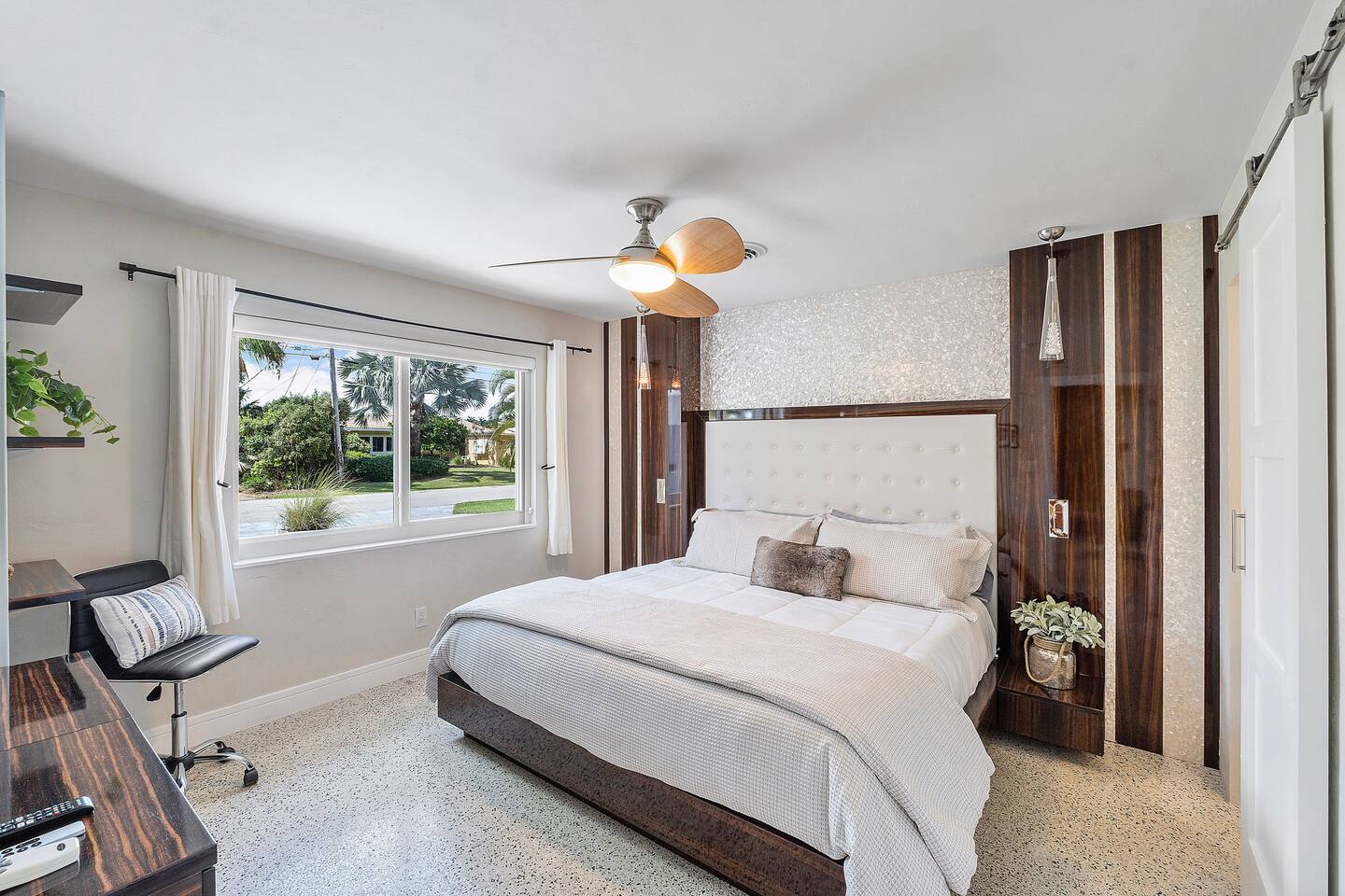 Wake up refreshed in this beautifully appointed bedroom featuring a luxurious king bed, modern décor, thoughtful touches, and the privacy of an attached ensuite bathroom.