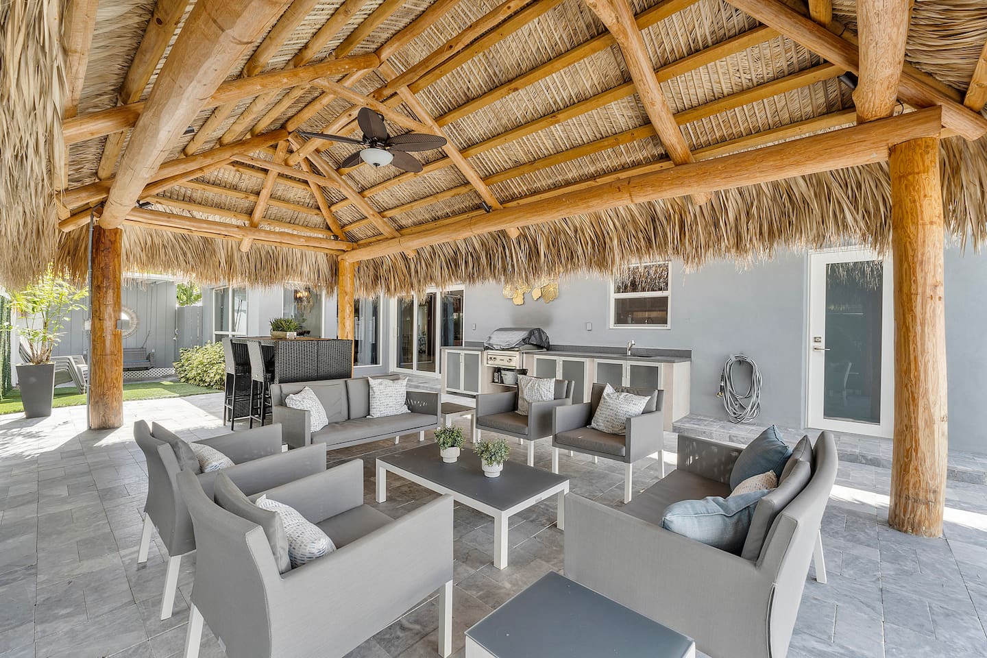 The backyard patio offers plenty of space to lounge, dine, and make the most of your private outdoor retreat.