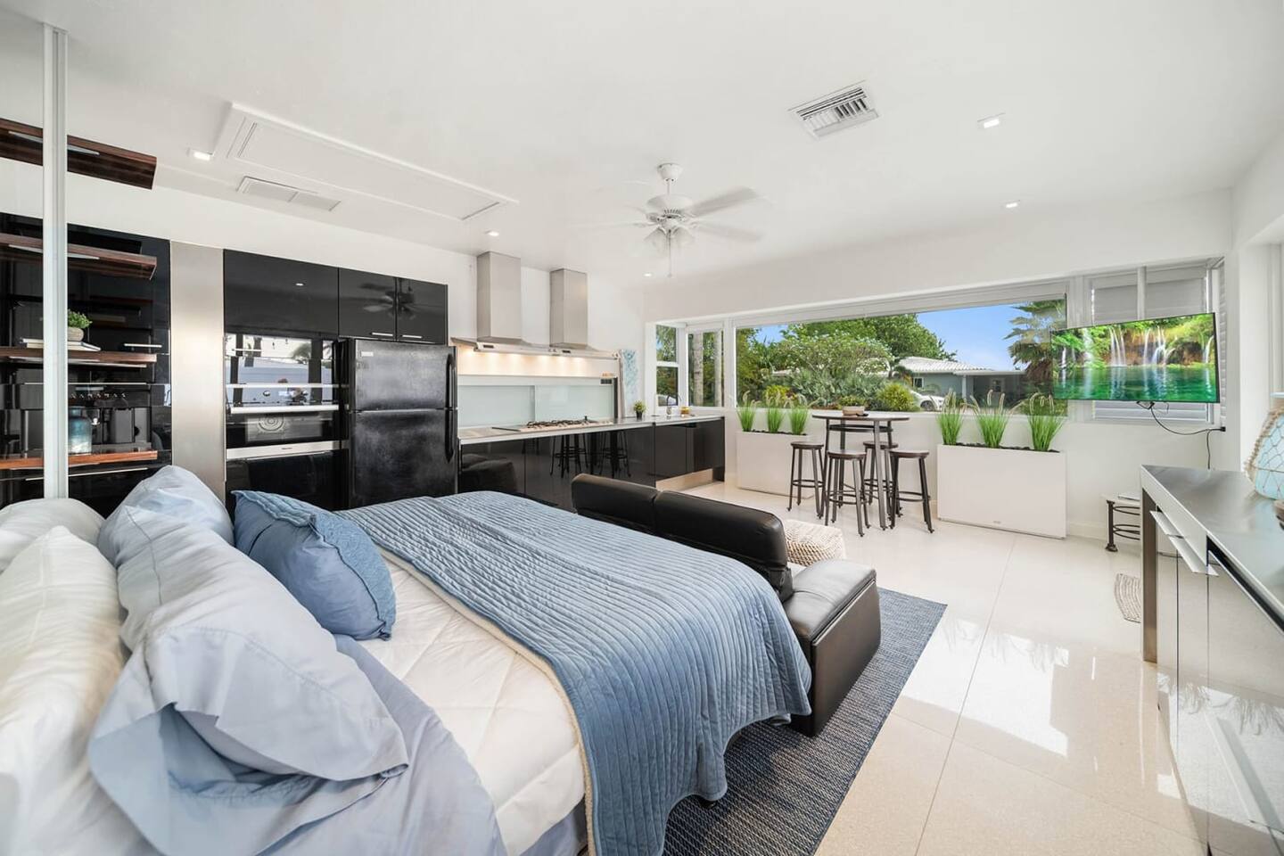 Here's the studio suite side of the home - also luminous with a sleek design