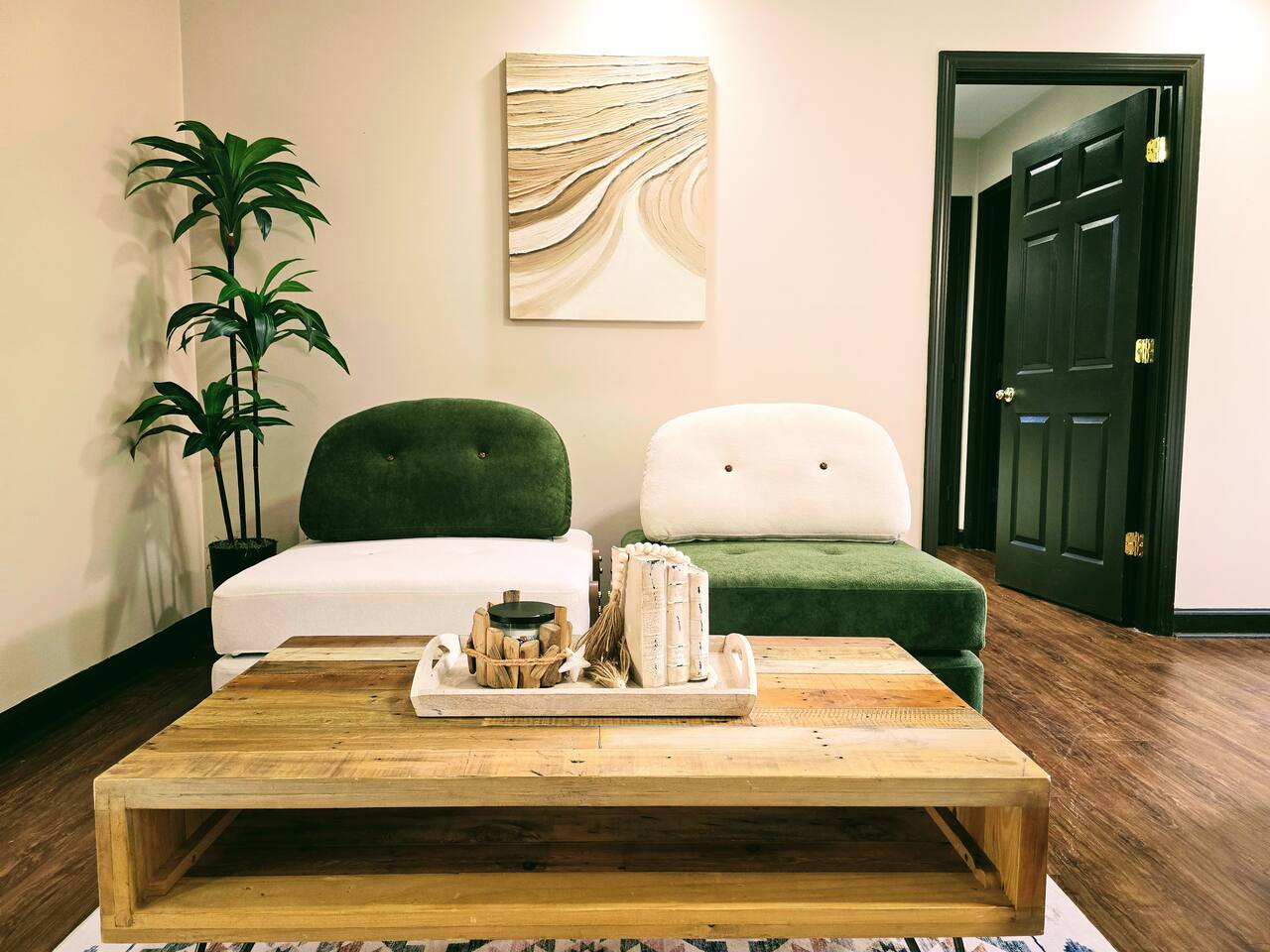 Escape from the hustle and bustle of the rest of the house in your own private living area and bathroom. Catch up on some Zzzs in this one of a kind, homemade, pallet wood bed or enjoy a book or movie in this versatile imported furniture.