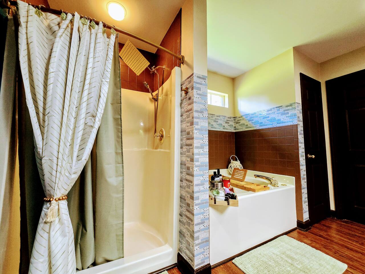 Relax, unwind, and customize your spa experience with your choice of salts, bombs, and scented candles. This spacious bathroom with walk-in closet is full of design and comfort features.