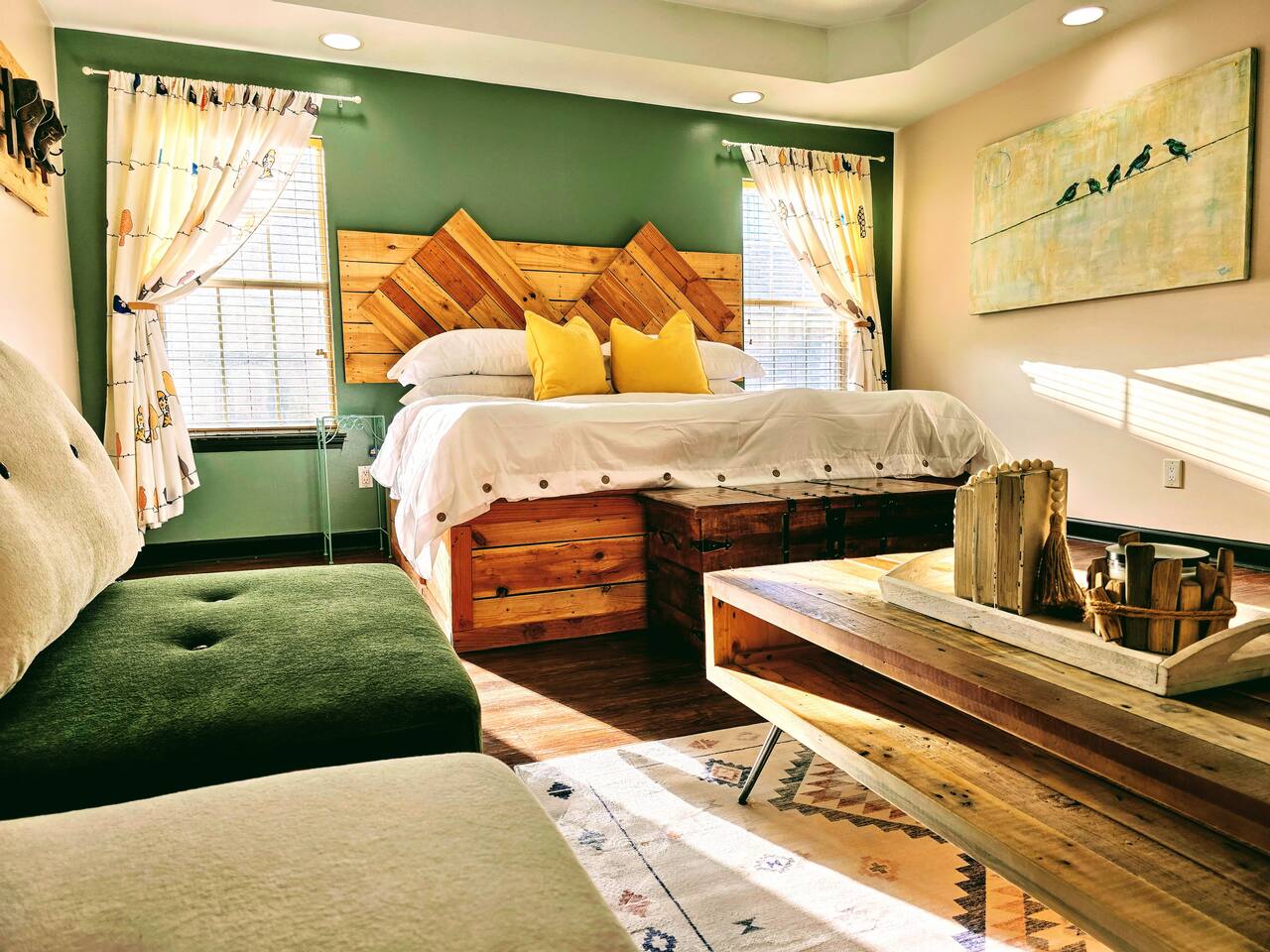 Escape from the hustle and bustle of the rest of the house in your own private living area and bathroom. Catch up on some Zzzs in this one of a kind, homemade, pallet wood bed or enjoy a book or movie in this versatile imported furniture.