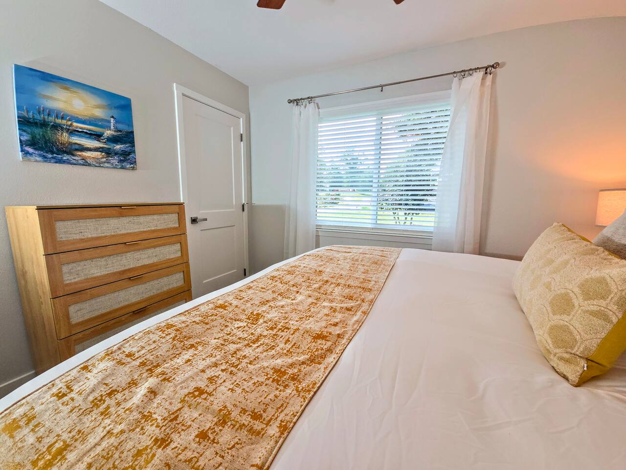 King bed, dresser and closet.