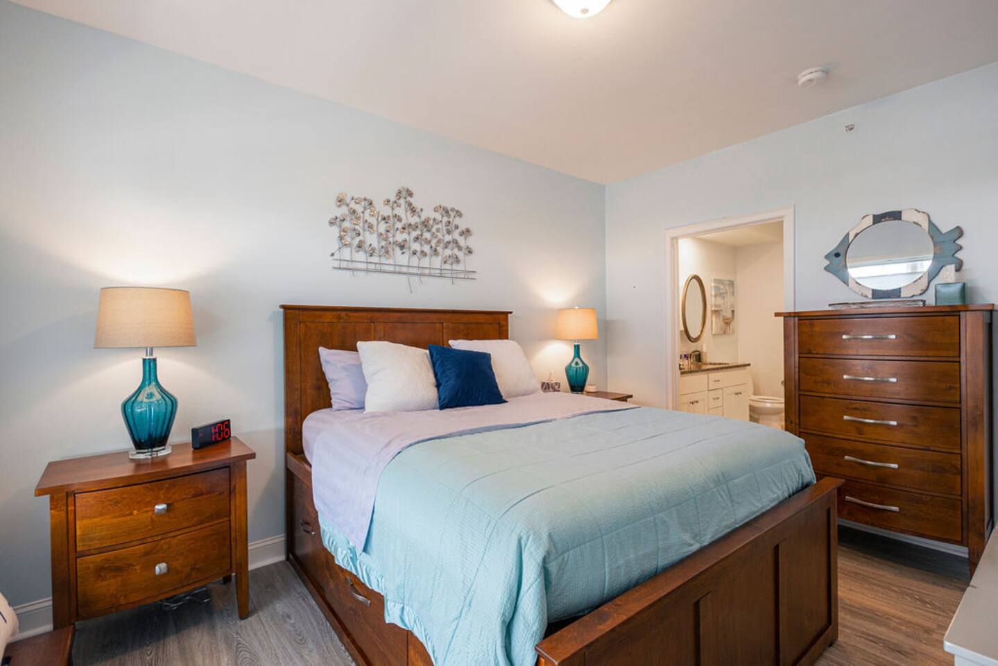 Queen size bed with plenty of available storage.