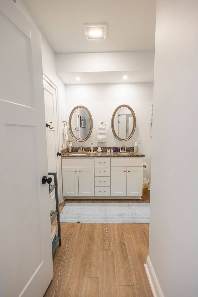 Spotless spacious bathroom with double vanity.
