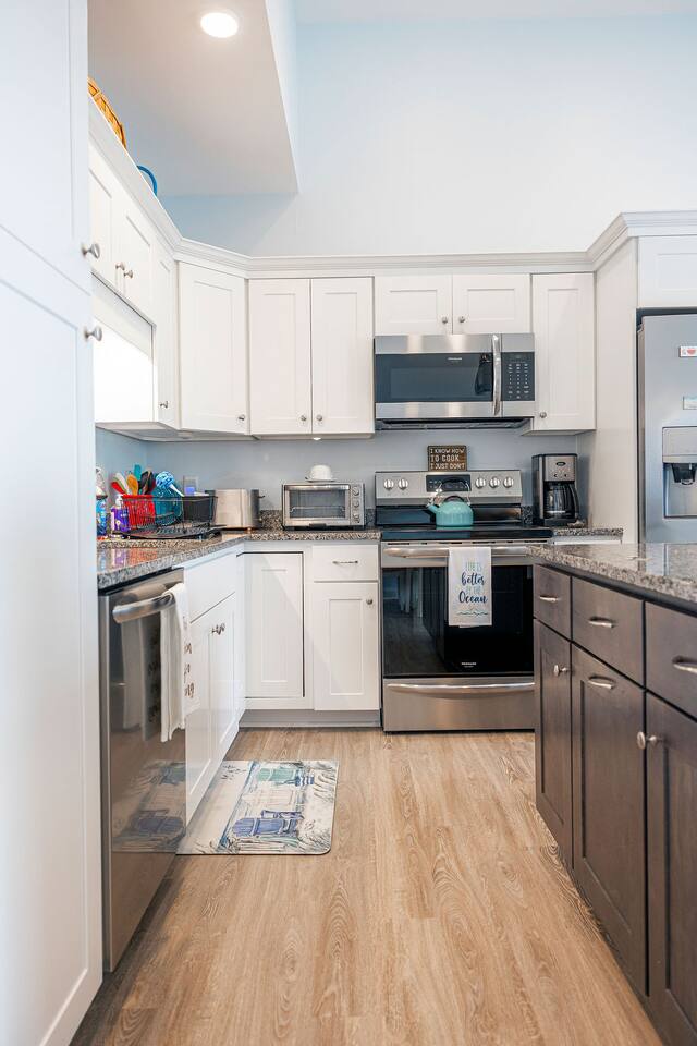 Spotless kitchen with everything needed.