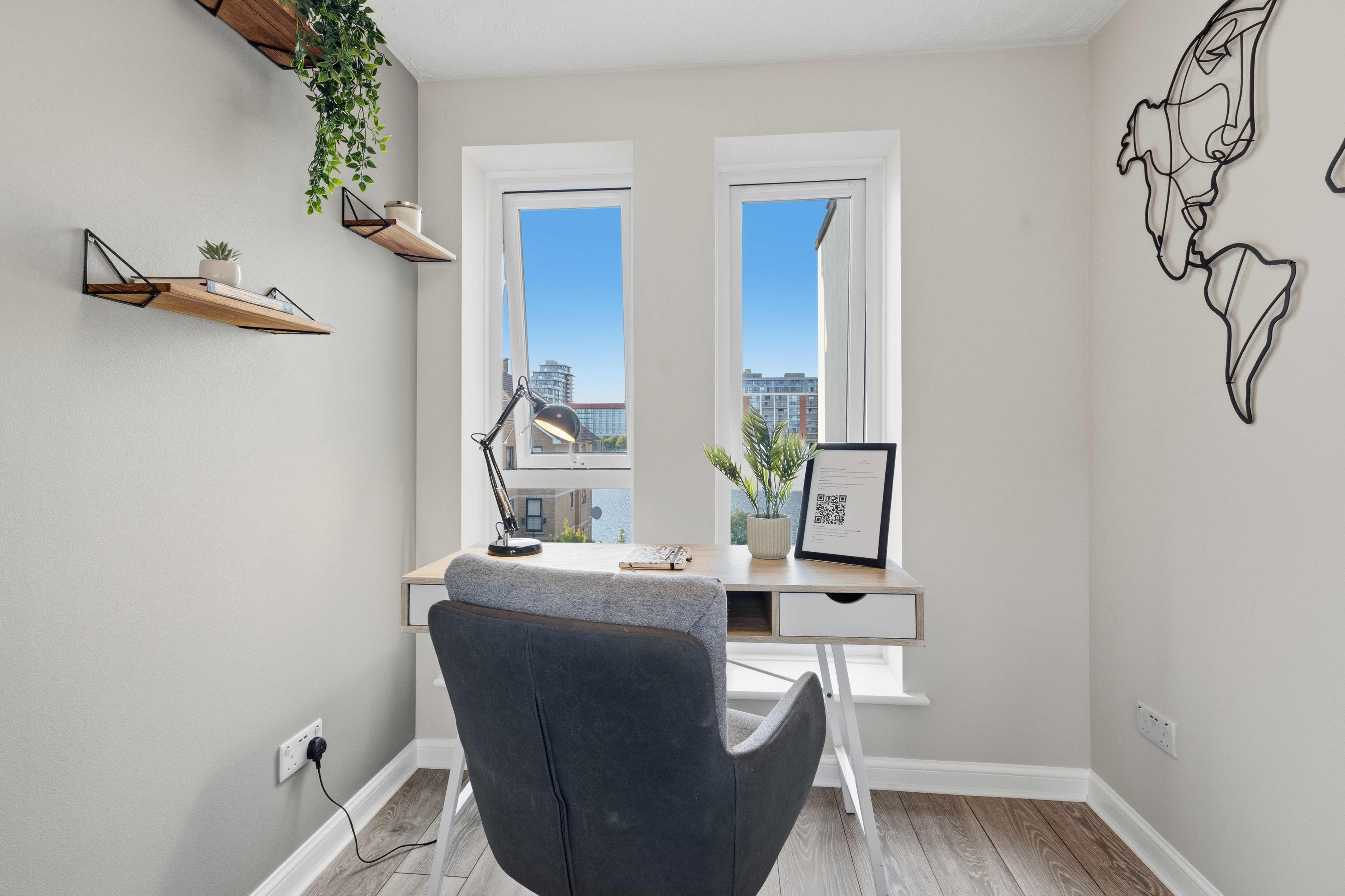 Bright home office nook with city views and stylish modern decor