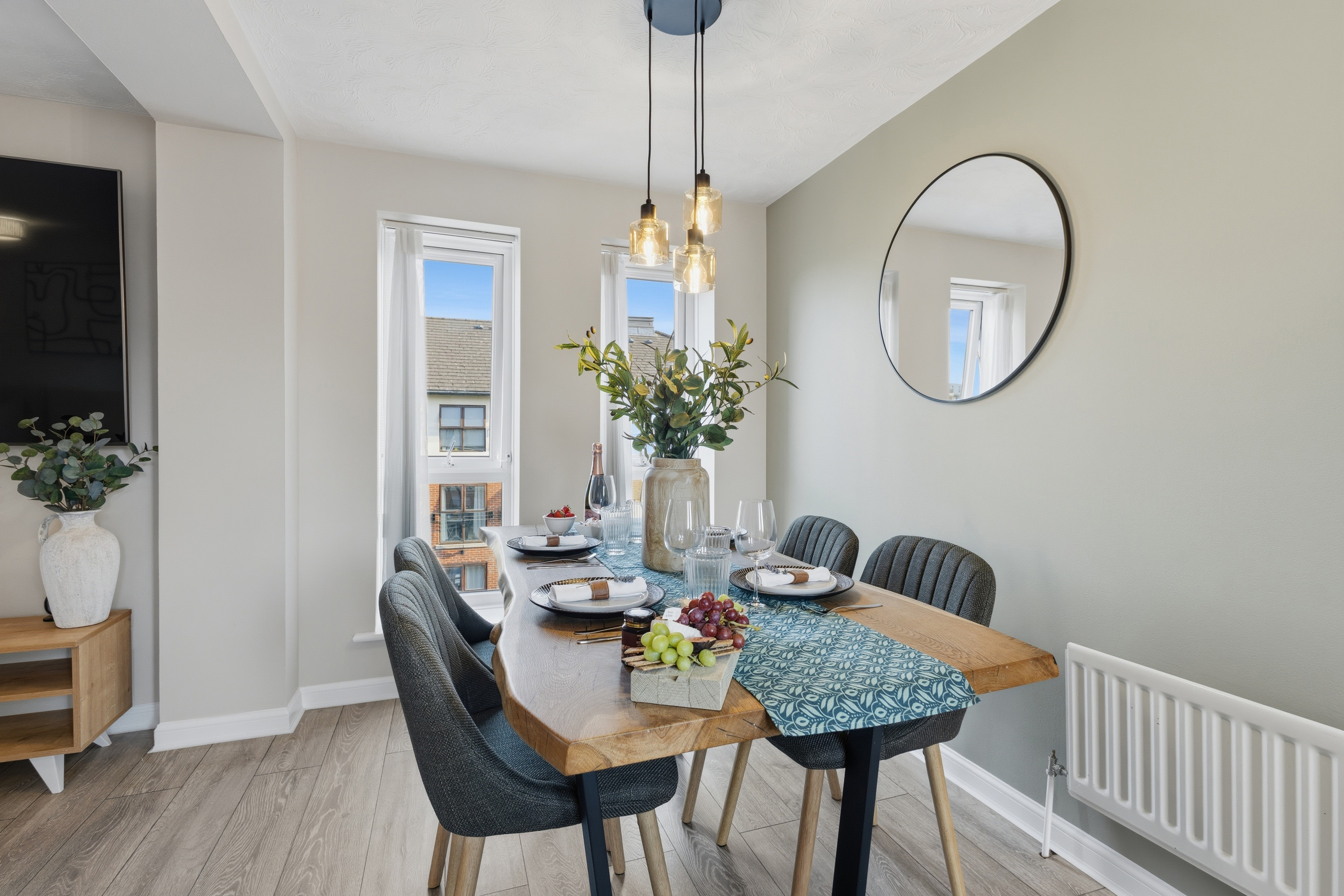 Bright modern dining space for 4 with natural light and stylish finishes