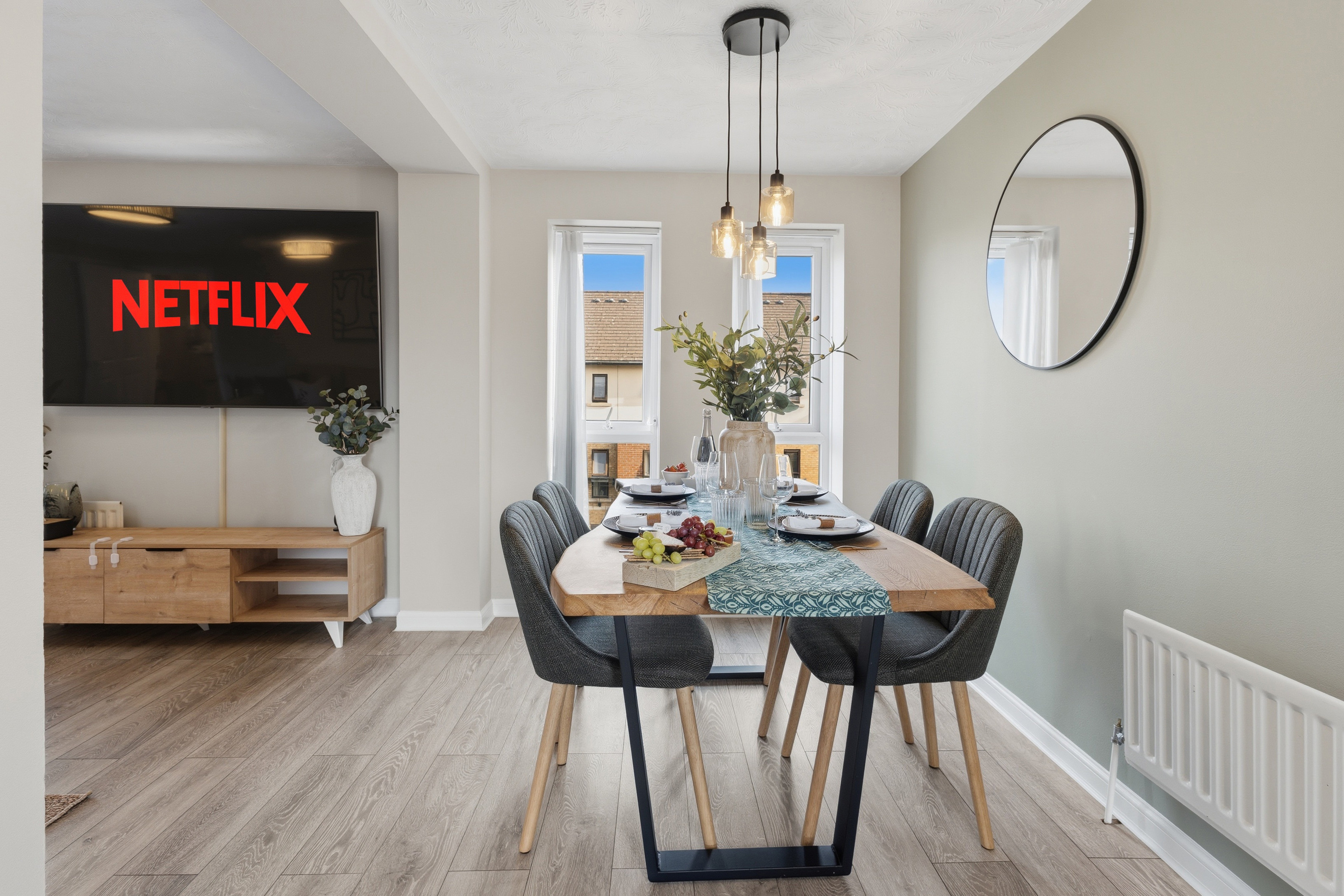 Bright modern dining space for 4 with Netflix and stylish decor