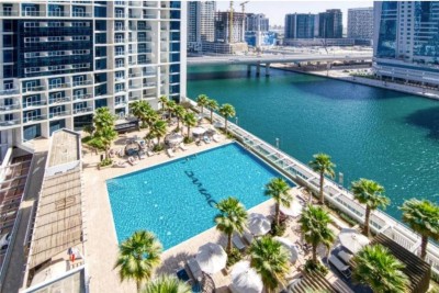Pool deck overlooking the Dubai Water Canal
