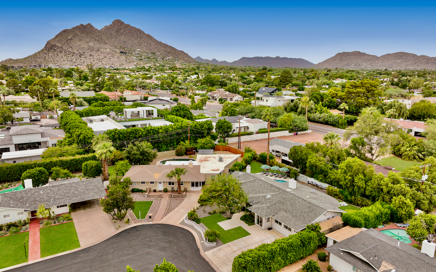 Quiet cul-de-sac home with lush landscaping and stunning mountain views