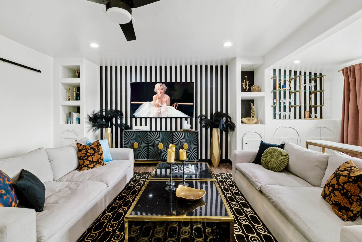 Living room with two sofas and 70" Smart TV