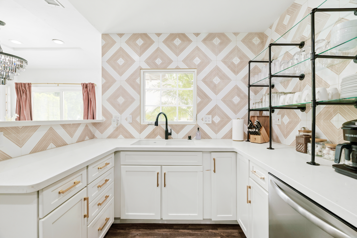 Kitchen with sink, dishwasher and open shelving