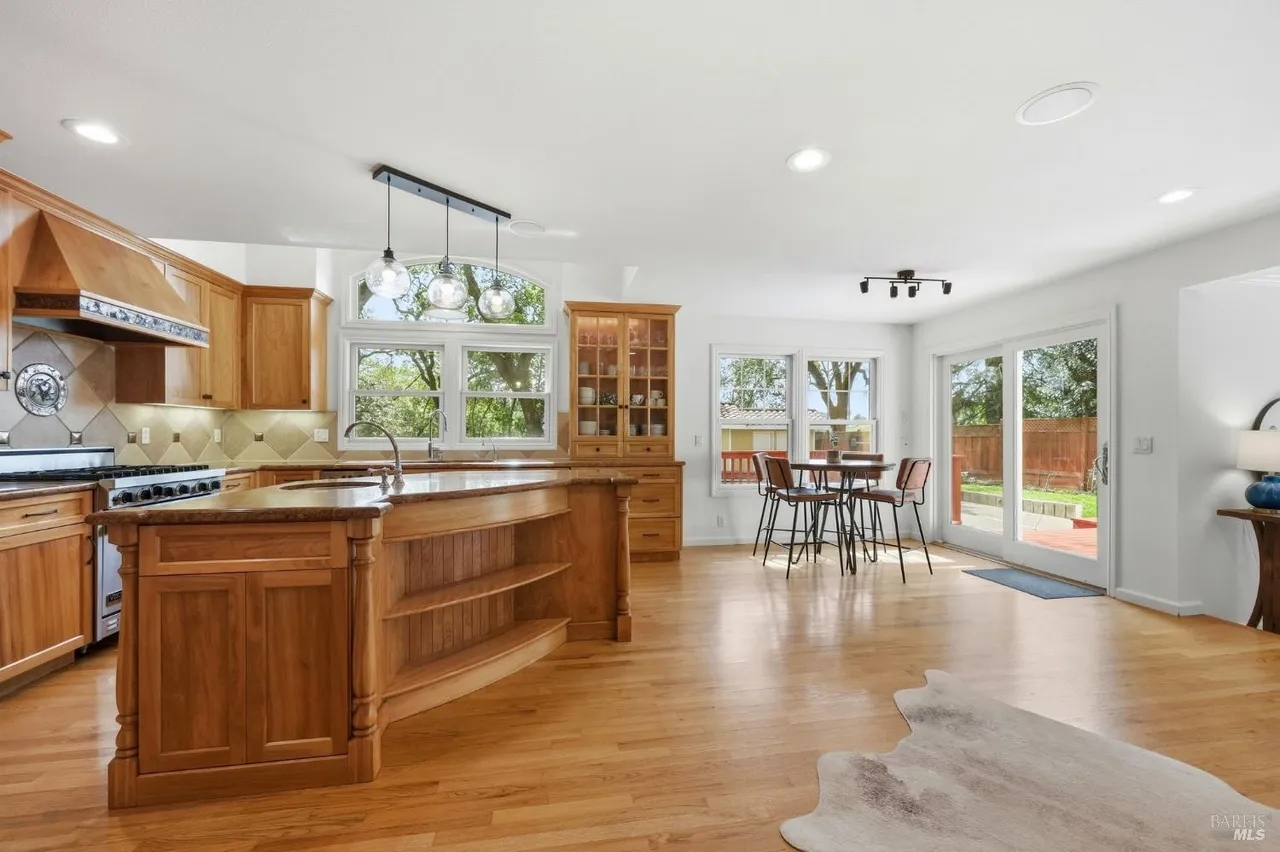 Bright open kitchen with large island and easy backyard access