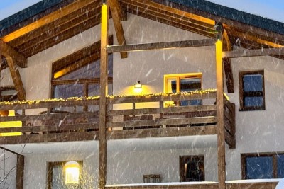 The chalet residence – traditional wood and stone facade