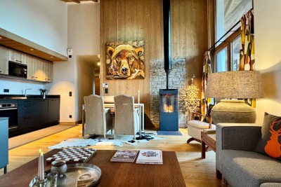 Living room with wood-burning stove and smart TV