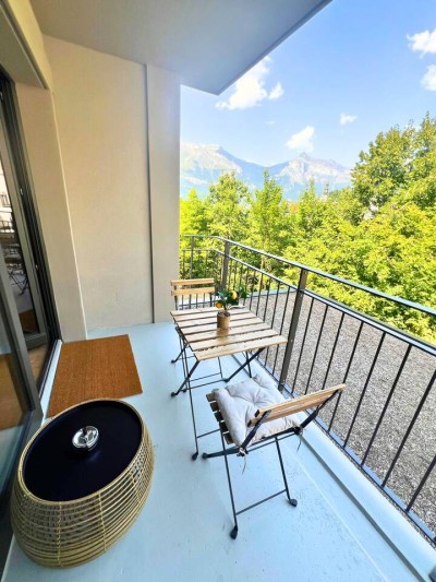 Balcony seating facing the mountains