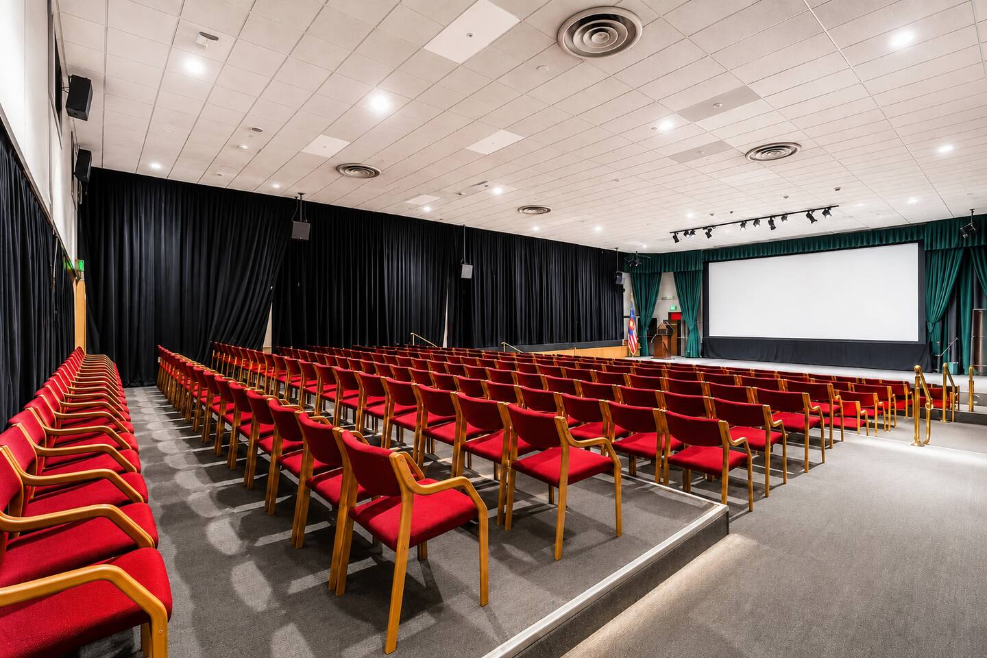 Spacious Event hall with a big screen - perfect for conferences, screenings, or presentations.