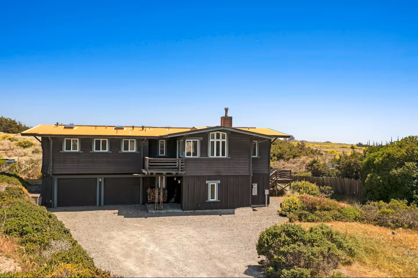 Private coastal retreat with spacious driveway and peaceful natural surroundings
