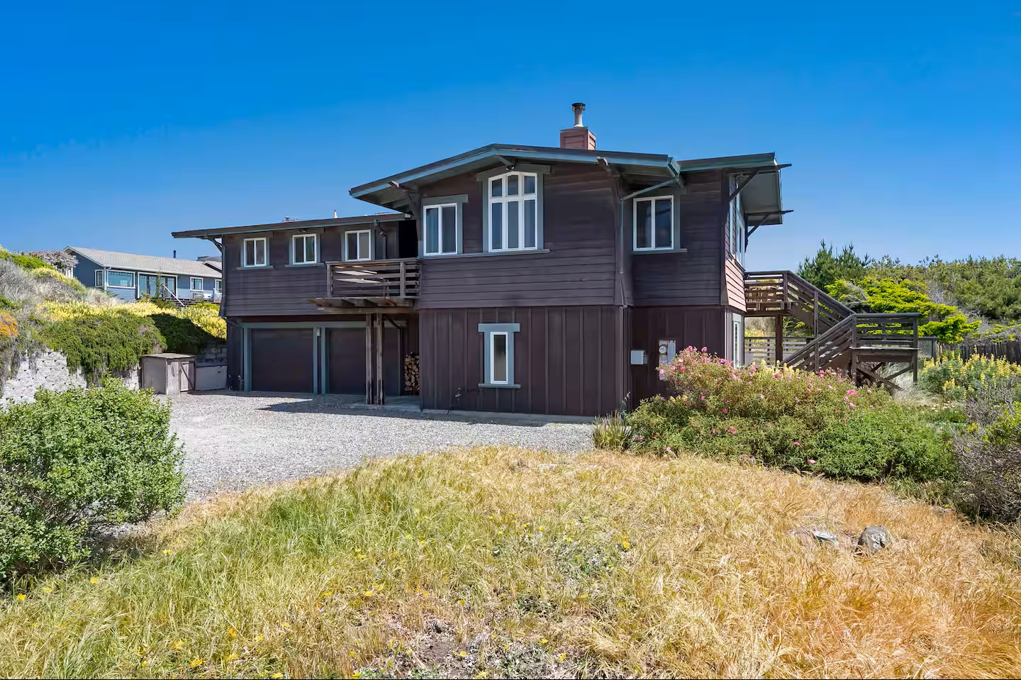 Spacious coastal retreat with decks, garage, and private natural setting